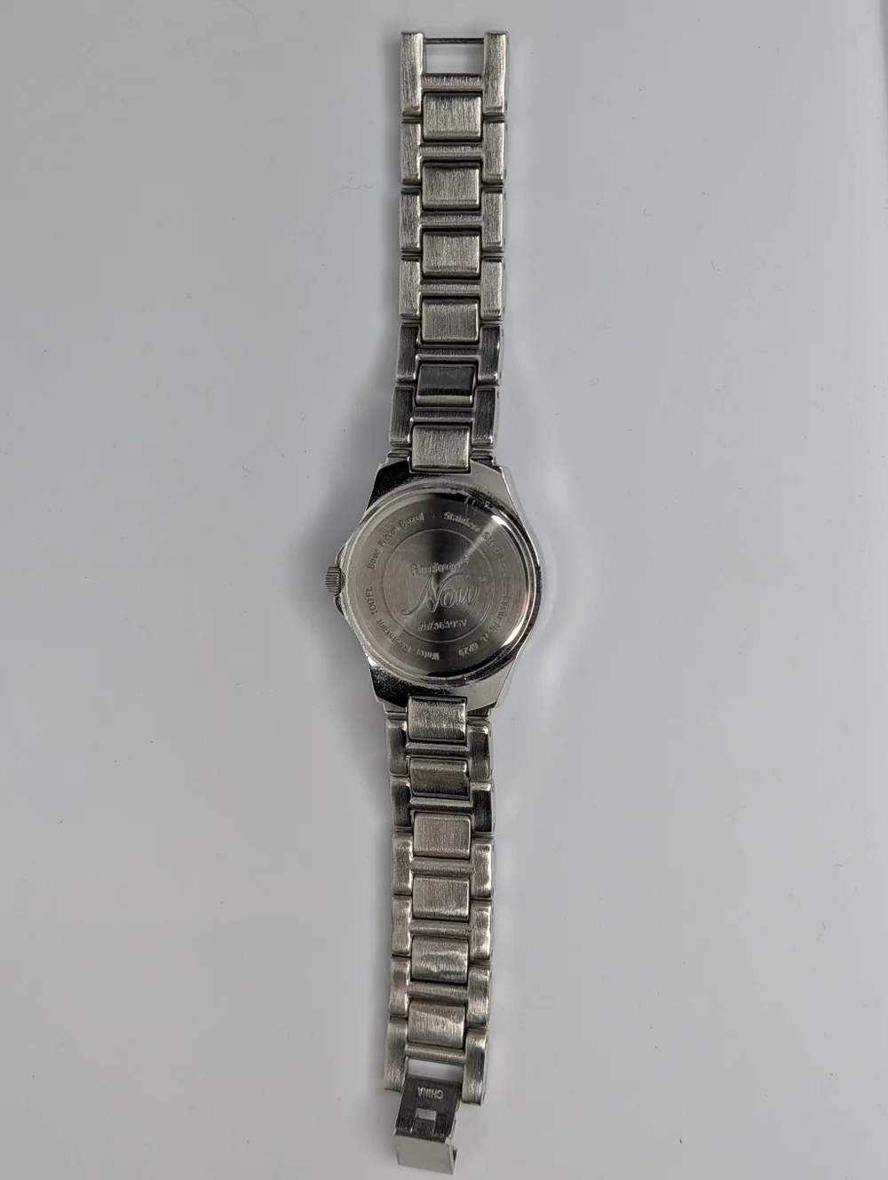 Armitron Now Watch Silver Tone Mother of Pearl Crystal Bezel Water Resistant